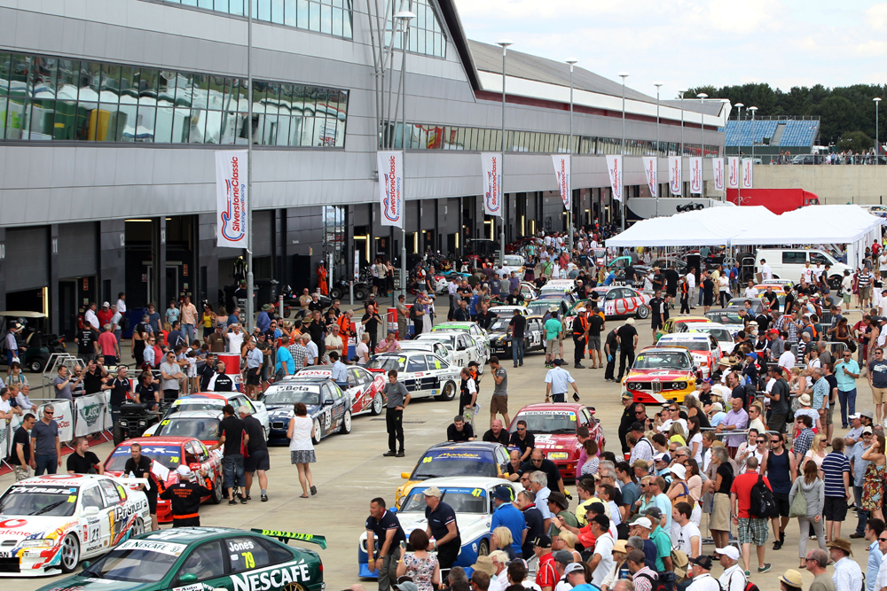 Fans look at the Super Touring cars